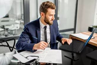 man working at computer