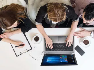 people working at computer